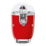 Smeg red juicer CJF11RDEU Side view with 0.6L container