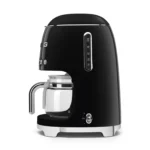 Smeg drip coffee machine black color, front view with glass carafe