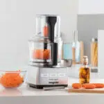 Magimix MX3200CH food processor front view with mixed vegetables inside