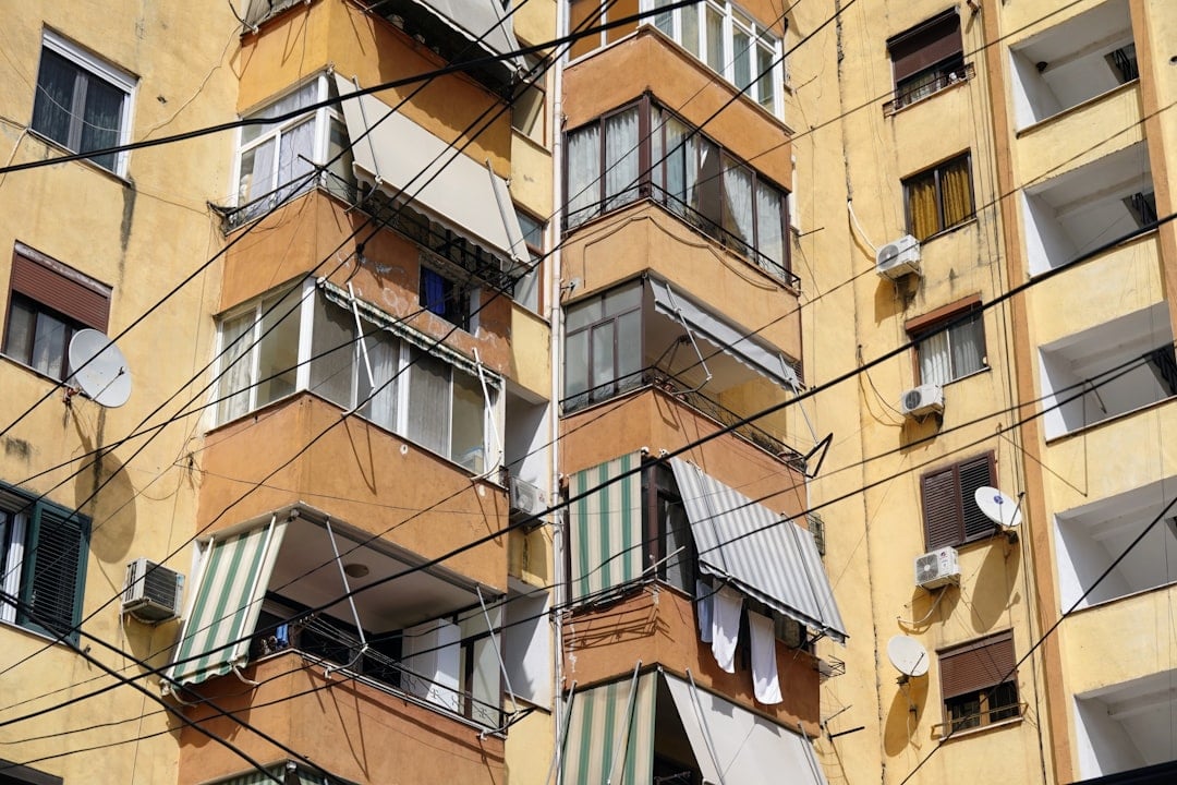 Wall-mounted air conditioners on an apartment building